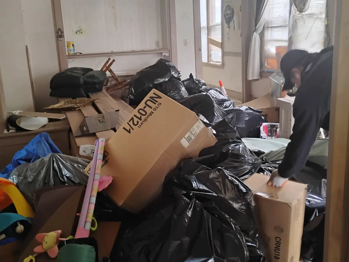 Indoor cleanout of trash bags, boxes and household items